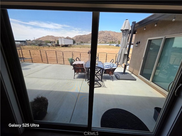 24236 Cahuilla Rd, Apple Valley, CA 92307 - view of patio / terrace featuring a mountain view