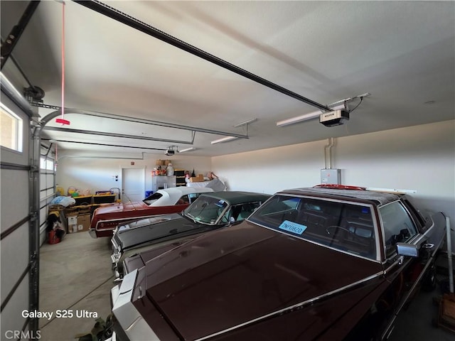 24236 Cahuilla Rd, Apple Valley, CA 92307 - garage featuring a garage door opener