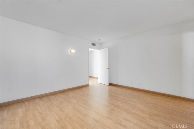 630 E Acacia Ave Unit 6, Glendale, CA 91205 - unfurnished room featuring baseboards, light wood finished floors, and visible vents