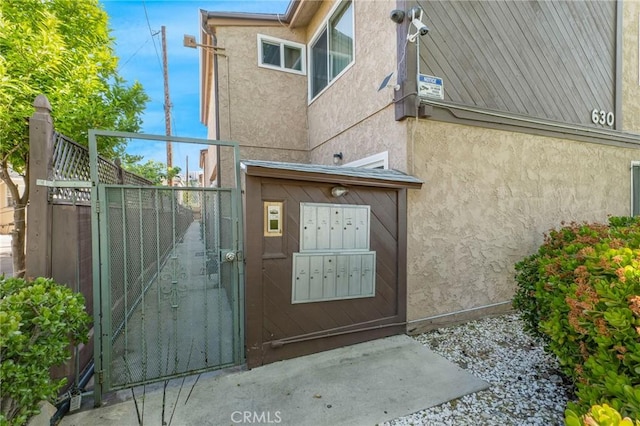 630 E Acacia Ave Unit 6, Glendale, CA 91205 - entrance to property with a gate and stucco siding