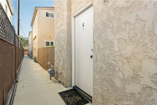 630 E Acacia Ave Unit 6, Glendale, CA 91205 - doorway to property with fence and stucco siding