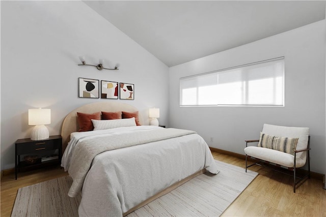 630 E Acacia Ave Unit 6, Glendale, CA 91205 - bedroom featuring baseboards, wood finished floors, and lofted ceiling