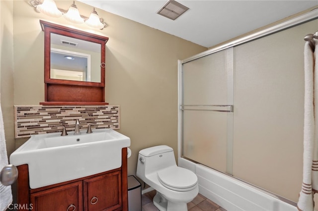 11 Northwind Ct Unit 41, Newport Beach, CA 92663 - full bath with vanity, backsplash, bath / shower combo with glass door, and tile patterned flooring