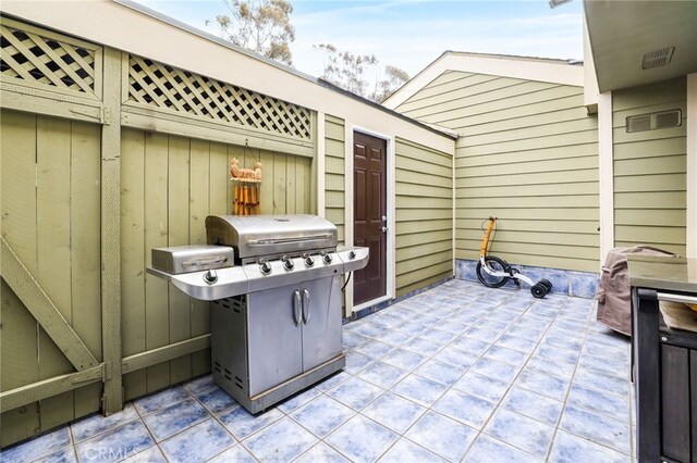 11 Northwind Ct Unit 41, Newport Beach, CA 92663 - view of patio featuring area for grilling