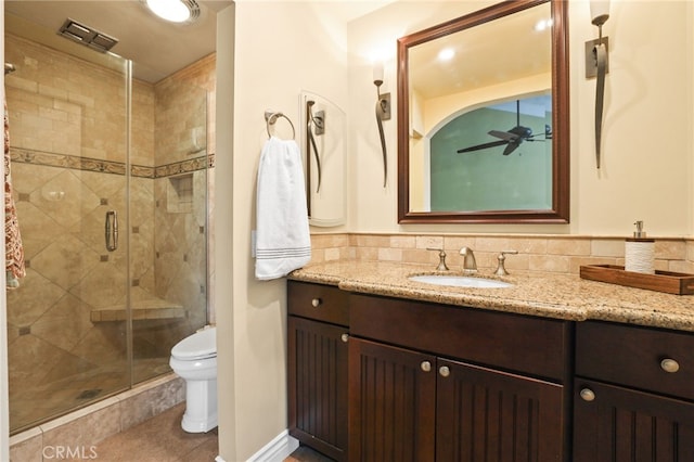 11 Northwind Ct Unit 41, Newport Beach, CA 92663 - bathroom featuring vanity, a shower stall, a ceiling fan, and tile patterned floors