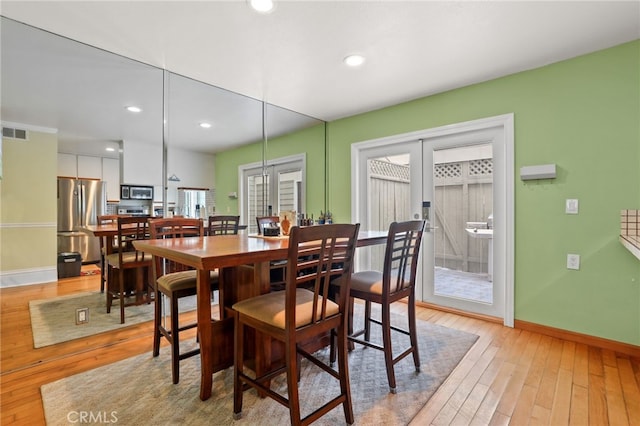 11 Northwind Ct Unit 41, Newport Beach, CA 92663 - dining room with light wood-style floors, french doors, and recessed lighting
