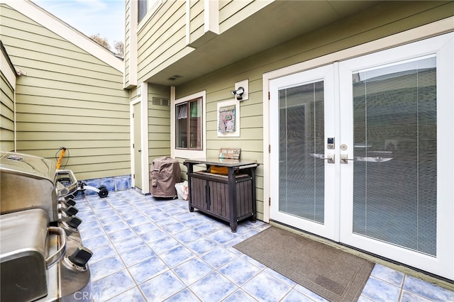 11 Northwind Ct Unit 41, Newport Beach, CA 92663 - view of patio featuring french doors