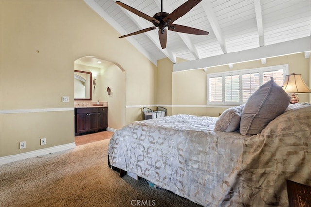 11 Northwind Ct Unit 41, Newport Beach, CA 92663 - bedroom with arched walkways, light carpet, high vaulted ceiling, ensuite bath, and a wood ceiling with exposed beams