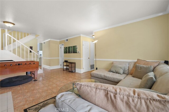 11 Northwind Ct Unit 41, Newport Beach, CA 92663 - living area with tile patterned floors, stairway, and crown molding