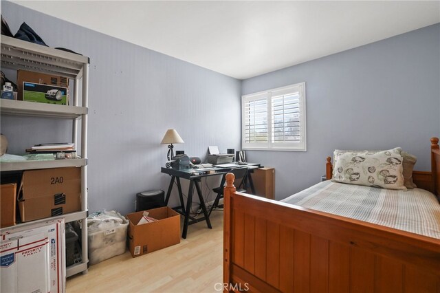 11 Northwind Ct Unit 41, Newport Beach, CA 92663 - bedroom with light wood-style flooring and a desk