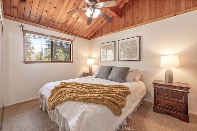 bedroom with carpet flooring, vaulted ceiling with beams, baseboards, a ceiling fan, and wood ceiling
