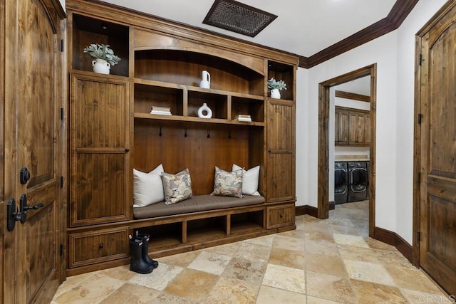 5015 Rancho Quinta Bnd, San Diego, CA 92130 - mudroom featuring independent washer and dryer, ornamental molding, and light stone finish floors