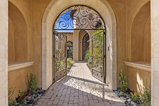 5015 Rancho Quinta Bnd, San Diego, CA 92130 - view of exterior entry featuring a gate