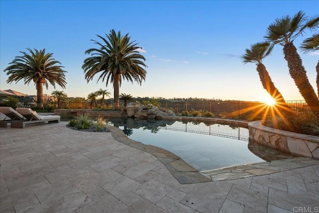 5015 Rancho Quinta Bnd, San Diego, CA 92130 - pool at dusk with a patio