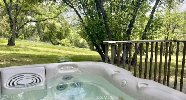 exterior space featuring a hot tub