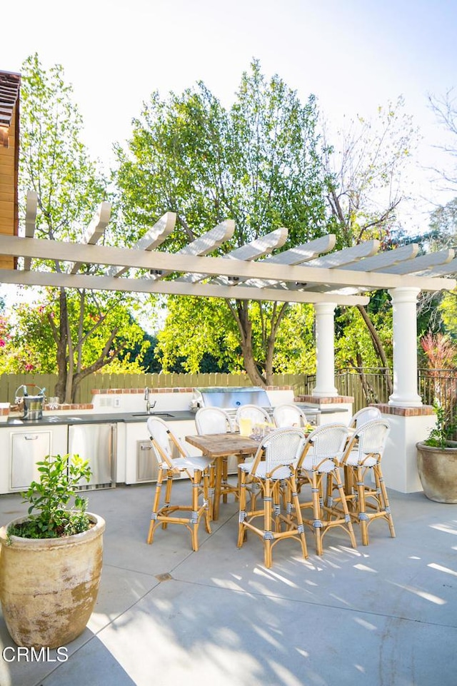 233 Hillside Rd, South Pasadena, CA 91030 - view of patio with a pergola, fence, and an outdoor kitchen