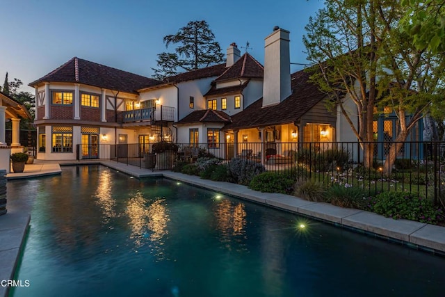 233 Hillside Rd, South Pasadena, CA 91030 - back of house featuring fence, stucco siding, a patio, and a chimney