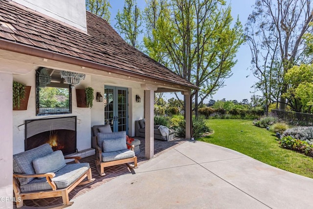 233 Hillside Rd, South Pasadena, CA 91030 - view of patio / terrace featuring a lit fireplace and french doors