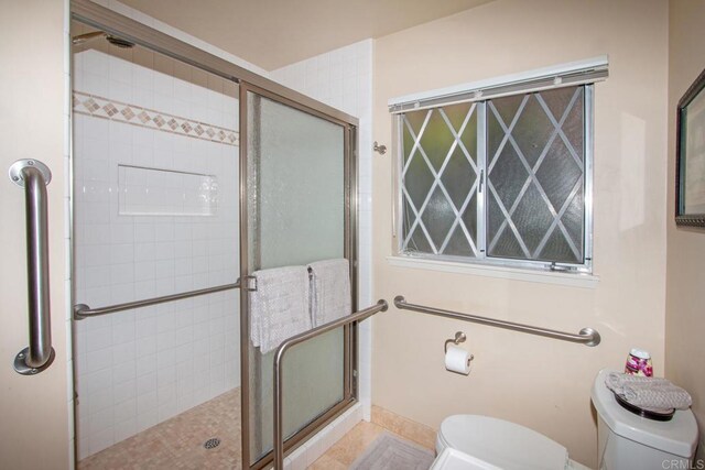 1143 Portola St, Vista, CA 92084 - full bathroom featuring toilet and a shower stall