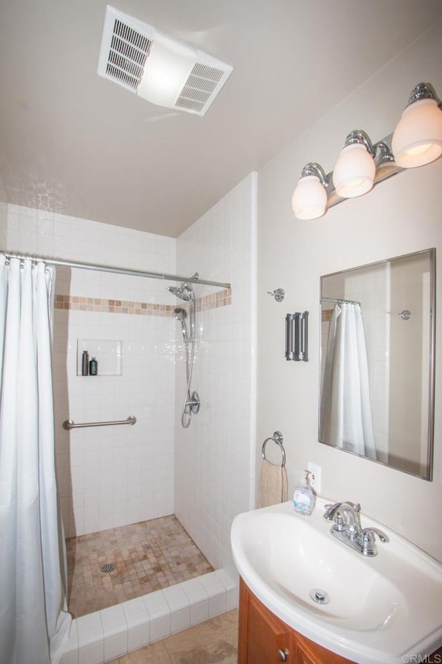 1143 Portola St, Vista, CA 92084 - full bath featuring a shower stall and vanity