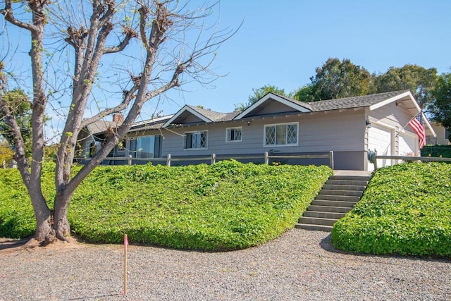 1143 Portola St, Vista, CA 92084 - single story home with stairway and an attached garage