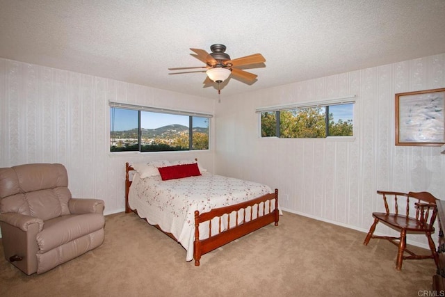 1143 Portola St, Vista, CA 92084 - carpeted bedroom featuring a textured ceiling and wallpapered walls