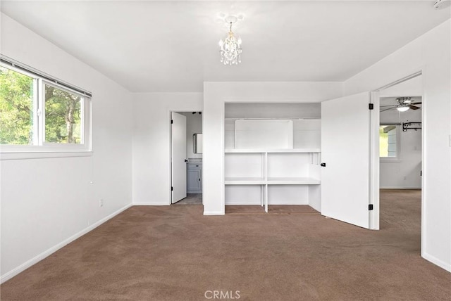 43 Zepher Way, Oroville, CA 95966 - unfurnished bedroom with carpet floors, baseboards, a chandelier, and a closet