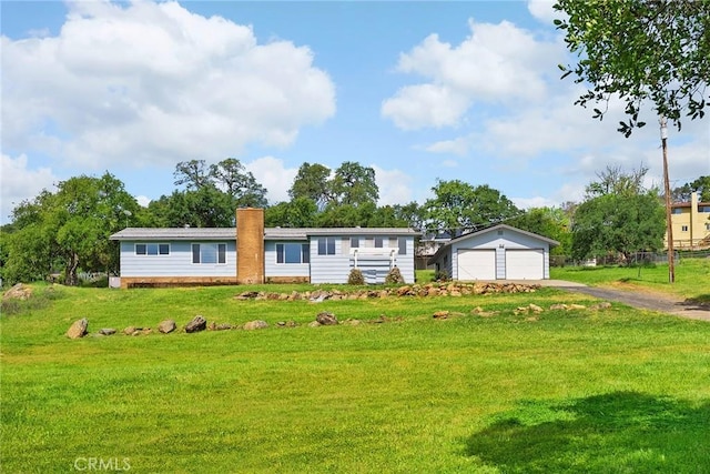 43 Zepher Way, Oroville, CA 95966 - single story home featuring a detached garage, an outbuilding, and a chimney