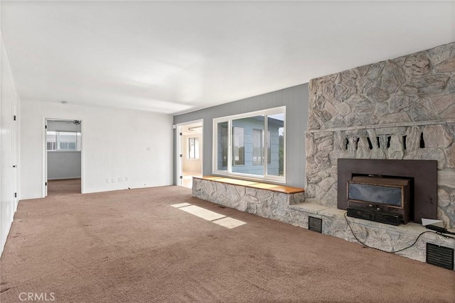 43 Zepher Way, Oroville, CA 95966 - unfurnished living room with a stone fireplace and carpet