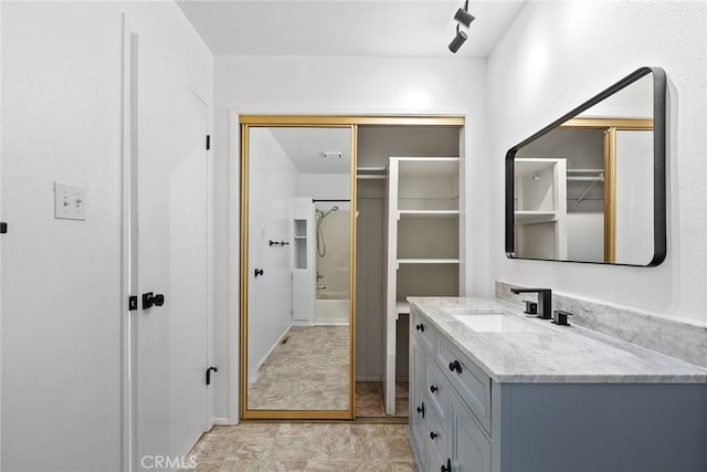 43 Zepher Way, Oroville, CA 95966 - full bathroom featuring vanity, a shower, and a walk in closet