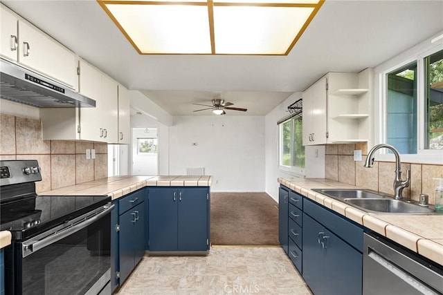 43 Zepher Way, Oroville, CA 95966 - kitchen with appliances with stainless steel finishes, a sink, extractor fan, blue cabinets, and ceiling fan