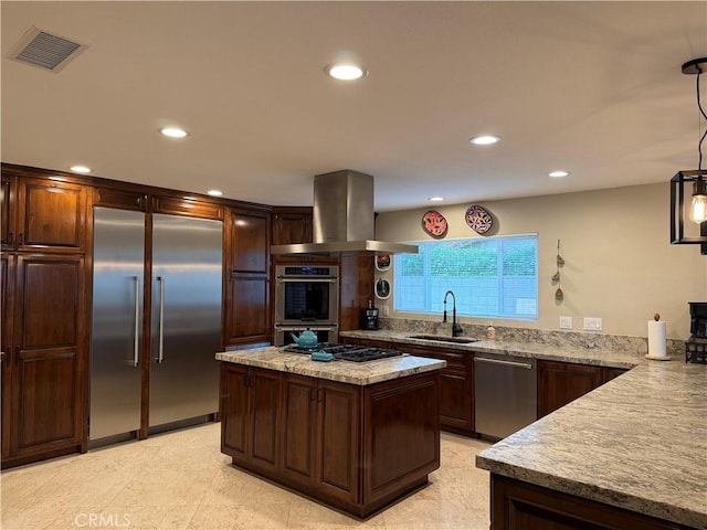 9033 Mandarin Ave, Rancho Cucamonga, CA 91701 - kitchen with stainless steel appliances, a sink, island exhaust hood, recessed lighting, and light stone countertops