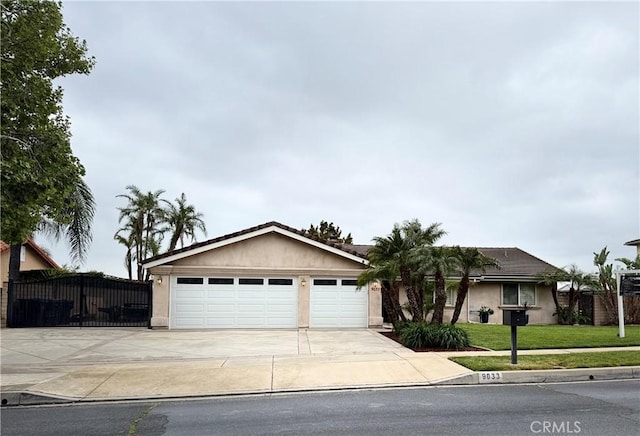 9033 Mandarin Ave, Rancho Cucamonga, CA 91701 - ranch-style house with concrete driveway, a garage, and stucco siding