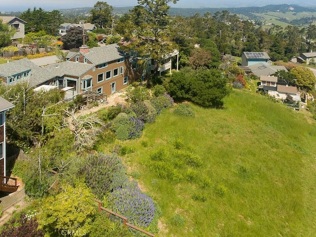 birds eye view of property with a residential view