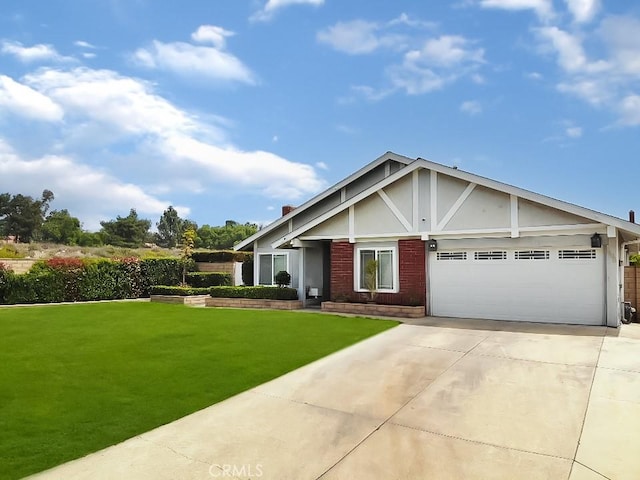 view of front of home with brick siding, an attached garage, stucco siding, concrete driveway, and a front yard