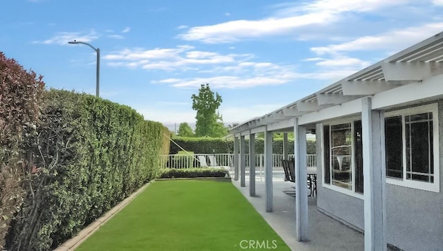 view of yard featuring fence