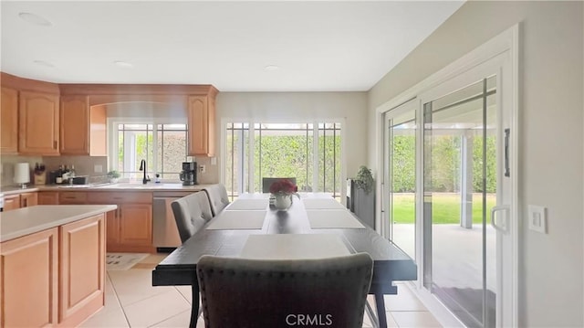 dining space with light tile patterned floors