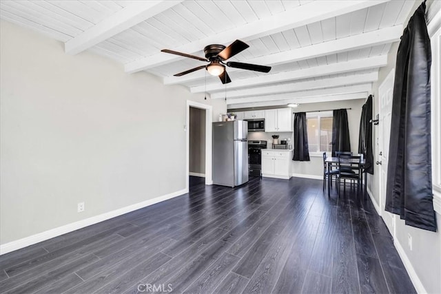 6558 Juniper Ave Unit 29, Palms, CA 92277 - unfurnished living room featuring beamed ceiling, a ceiling fan, baseboards, and dark wood-style floors