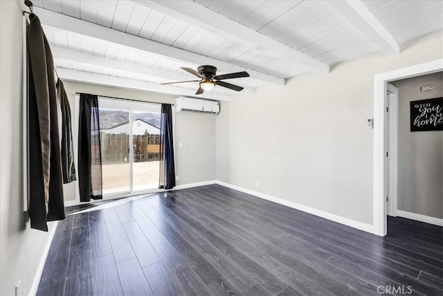 6558 Juniper Ave Unit 29, Palms, CA 92277 - empty room featuring dark wood finished floors, a wall mounted AC, baseboards, and ceiling fan