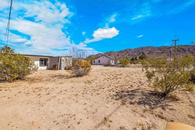 6558 Juniper Ave Unit 29, Palms, CA 92277 - view of yard with a mountain view