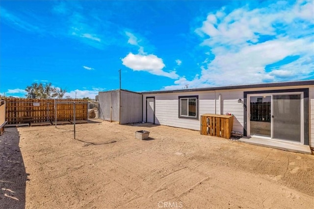 6558 Juniper Ave Unit 29, Palms, CA 92277 - back of property with a fenced backyard