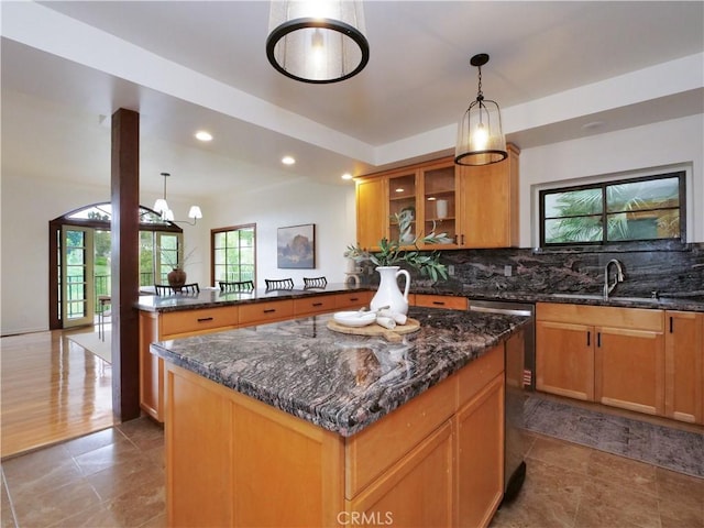 4300 Via Alondra, Palos Verdes Estates, CA 90274 - kitchen with dark stone counters, a sink, decorative backsplash, a peninsula, and stainless steel dishwasher