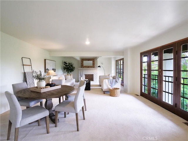 4300 Via Alondra, Palos Verdes Estates, CA 90274 - dining area with visible vents, a fireplace, and carpet