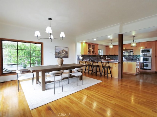 4300 Via Alondra, Palos Verdes Estates, CA 90274 - dining area with light wood-style flooring and a chandelier