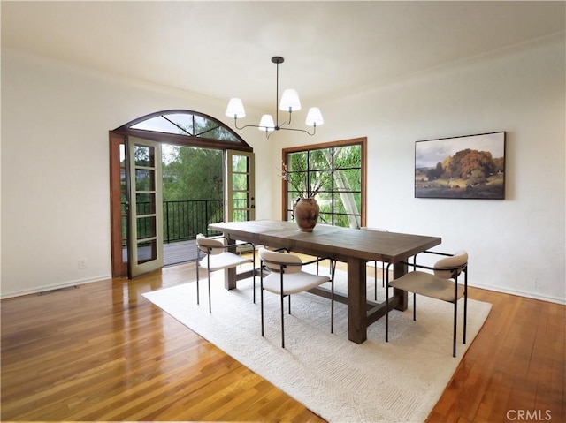 4300 Via Alondra, Palos Verdes Estates, CA 90274 - dining area featuring an inviting chandelier, wood finished floors, and baseboards