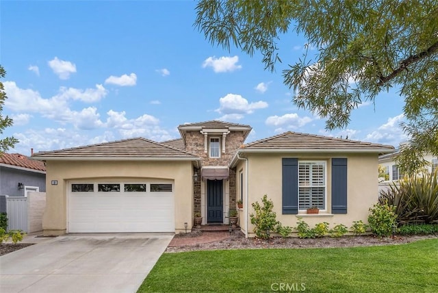 18 Corte Sevilla, San Clemente, CA 92673 - view of front of house featuring an attached garage, stucco siding, driveway, and a front yard