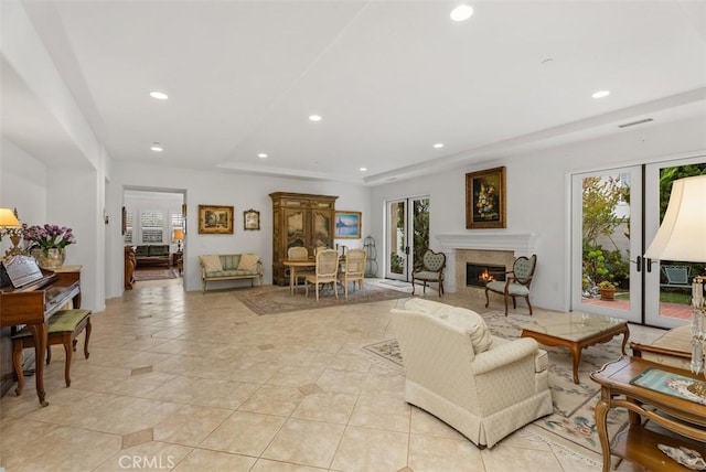 18 Corte Sevilla, San Clemente, CA 92673 - living room featuring recessed lighting, a high end fireplace, light tile patterned floors, and a raised ceiling