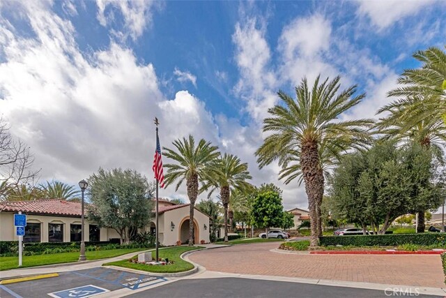 18 Corte Sevilla, San Clemente, CA 92673 - view of building exterior with uncovered parking