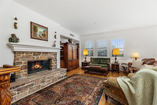 18 Corte Sevilla, San Clemente, CA 92673 - living room featuring a fireplace and wood finished floors