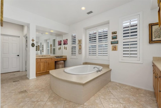 18 Corte Sevilla, San Clemente, CA 92673 - bathroom with vanity, a garden tub, tile patterned floors, baseboards, and recessed lighting